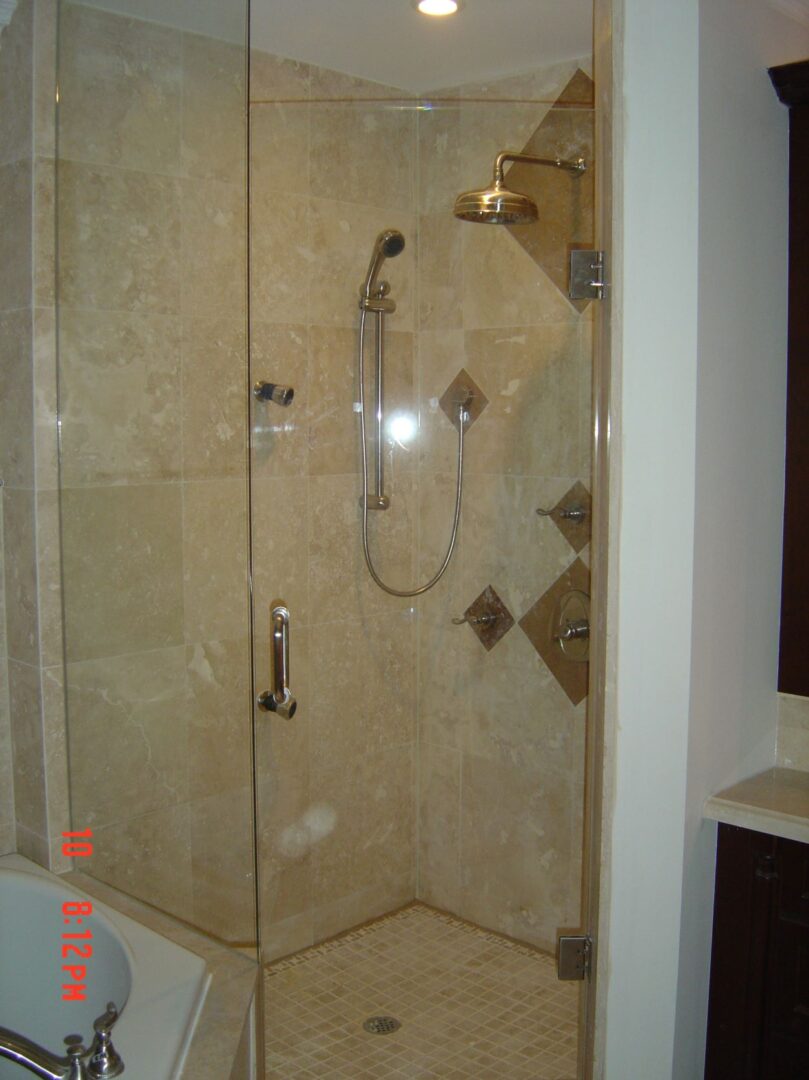 A Glass Shower With Tiles Wall for Shower