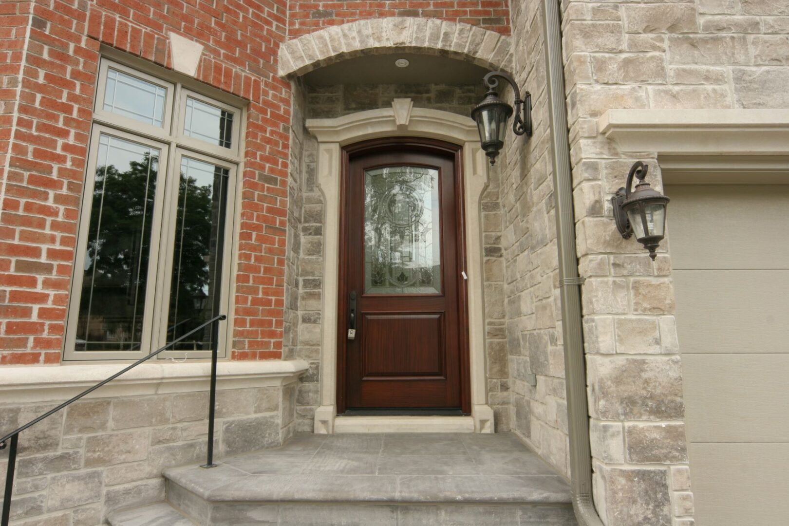 The Front of a House With a Stone Entrance