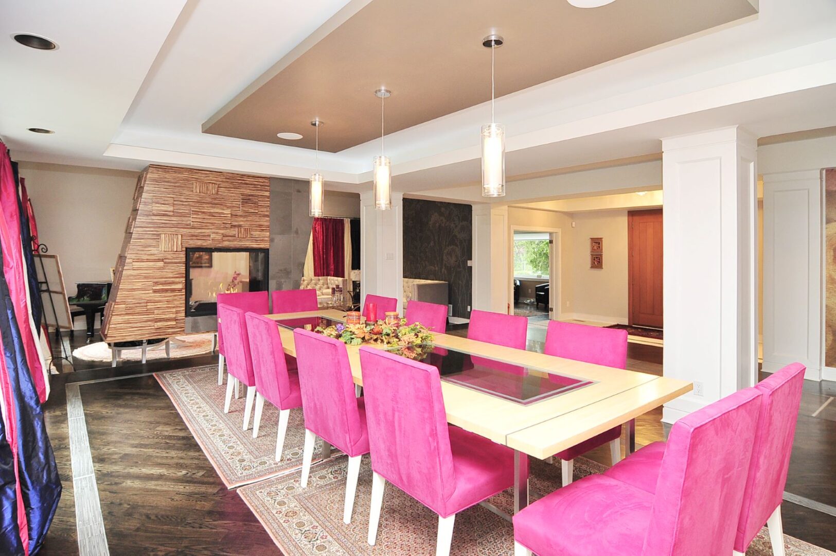 Pink Color Cushioned Chairs for a Dining Table