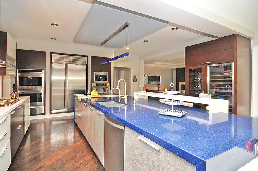 A Kitchen Island With a Blue Color Counter