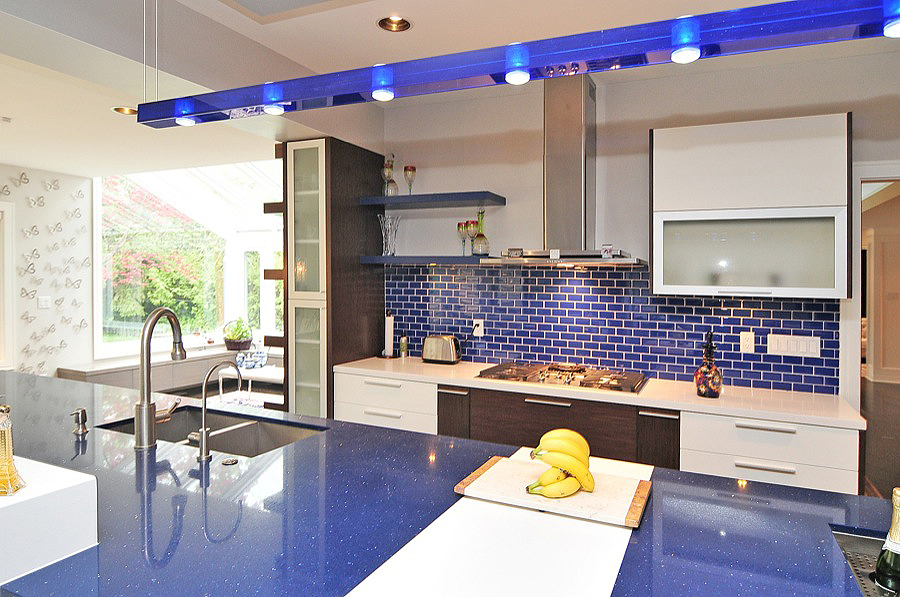 A Blur Color Themed Kitchen With Lights