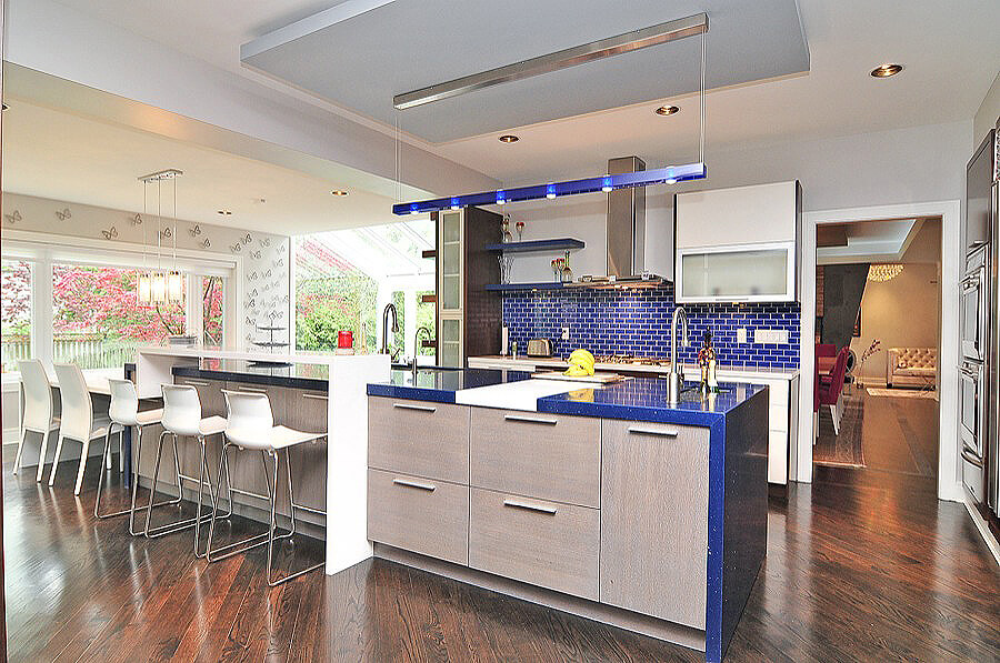 A Kitchen With a Blue and White Counter